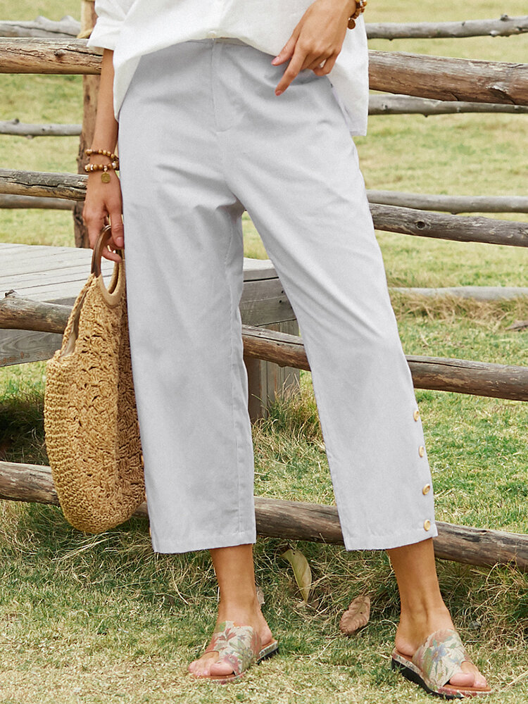 Pantalon rayé avec poche boutonnée sur le devant