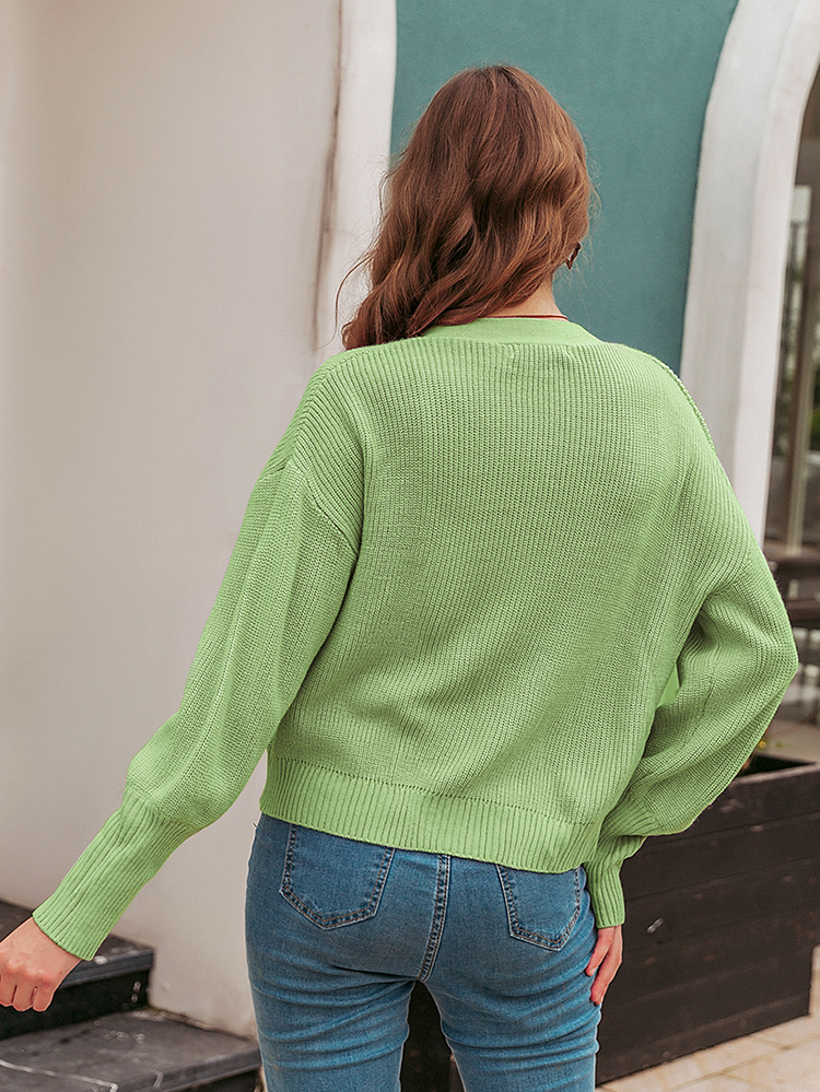 Solid rib knit long sleeve front button sweater