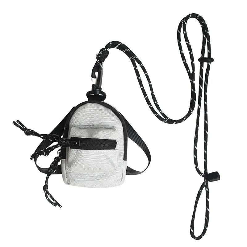 Módní mini kabelka s přívěskem