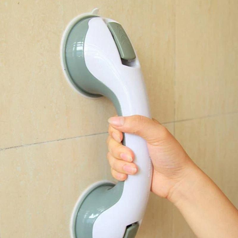 Bathroom handrail with suction cup handle