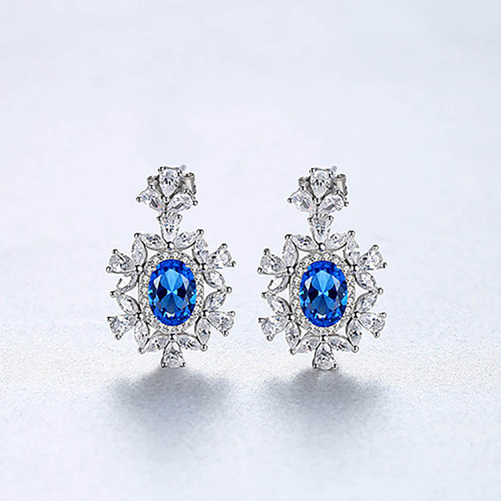 Oval Shaped Cut Blue Snowflake Sterling Silver Earrings