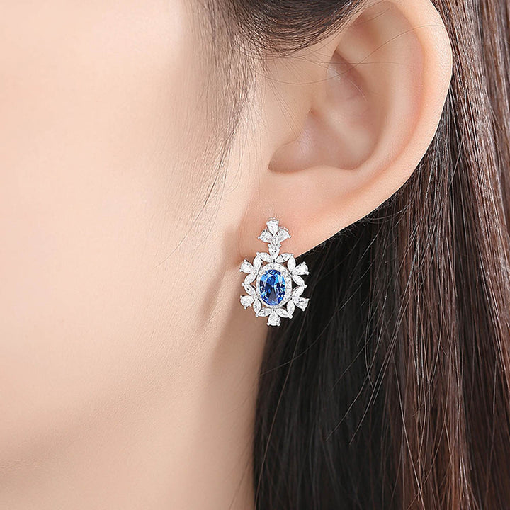 Oval Shaped Cut Blue Snowflake Sterling Silver Earrings
