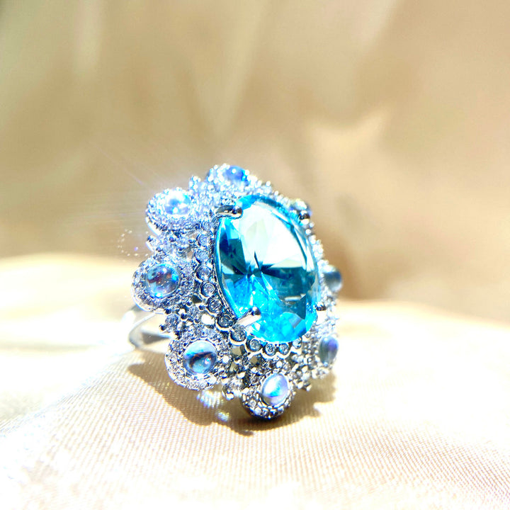 Flower Design Blue Oval Shaped Cut Open Ring