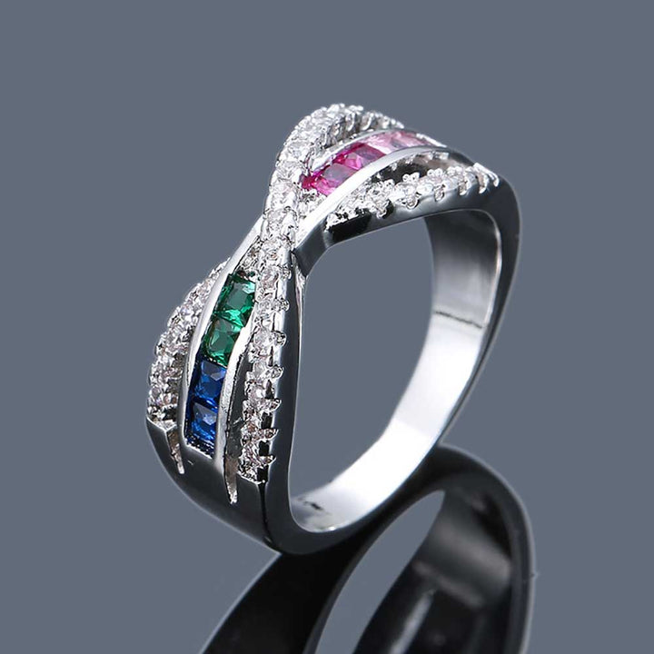 Radiant Shaped Cut Rainbow Cross Design Ring