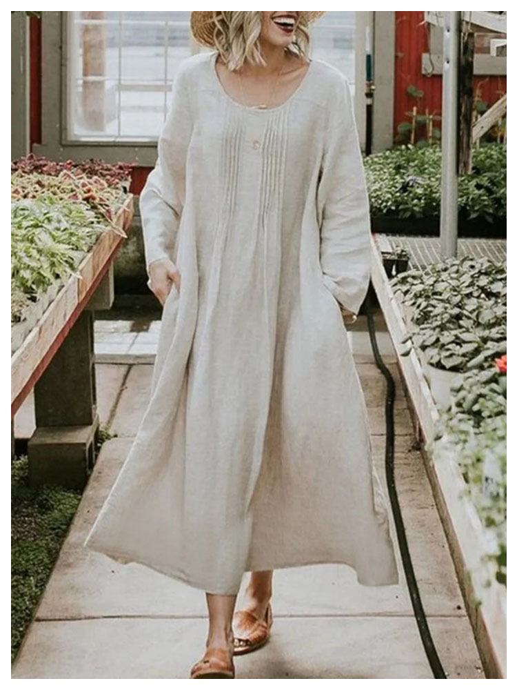 فستان من الكتان القطني بلون سادة وأكمام طويلة